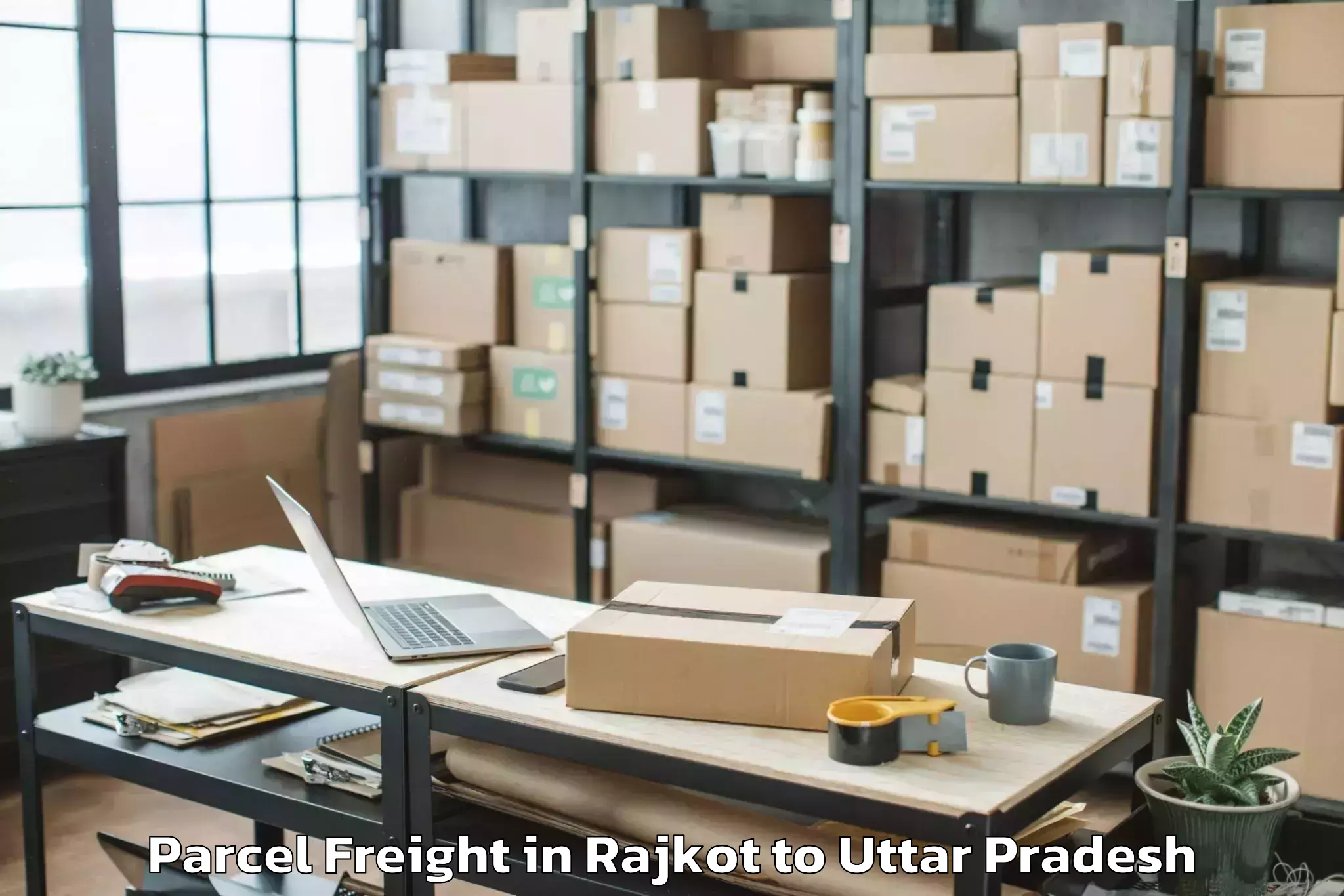 Leading Rajkot to Renukoot Parcel Freight Provider